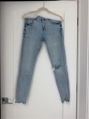 Zara Light Blue Skinny Jeans with Knee Rip